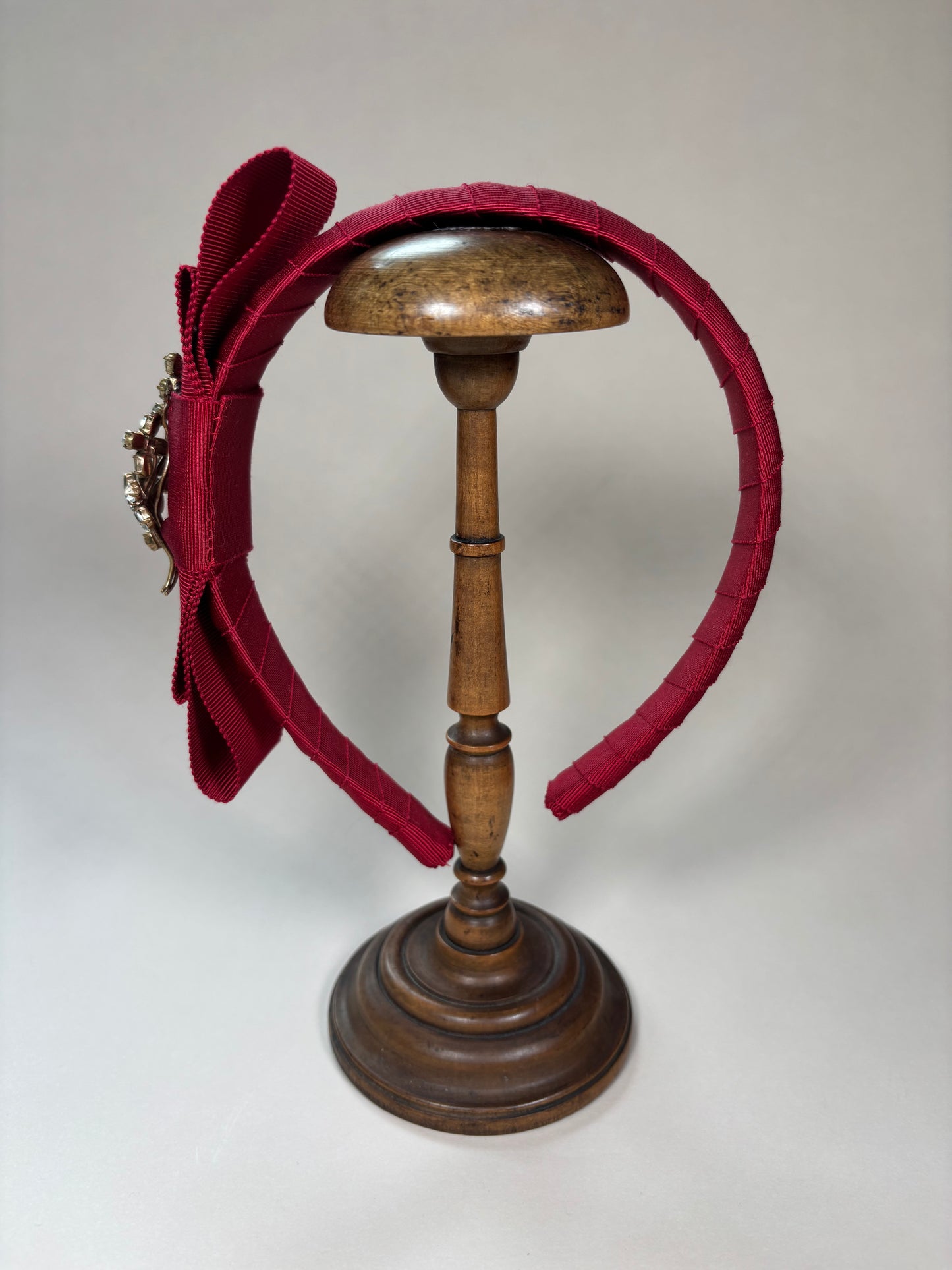 Red headband with a sparkling vintage flower