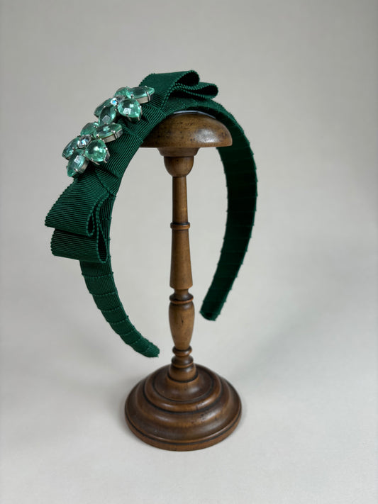 Statement piece in moss green with sparkling flower