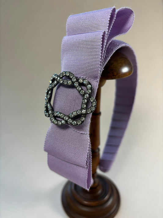 Lilac coloured headband with antique ornament