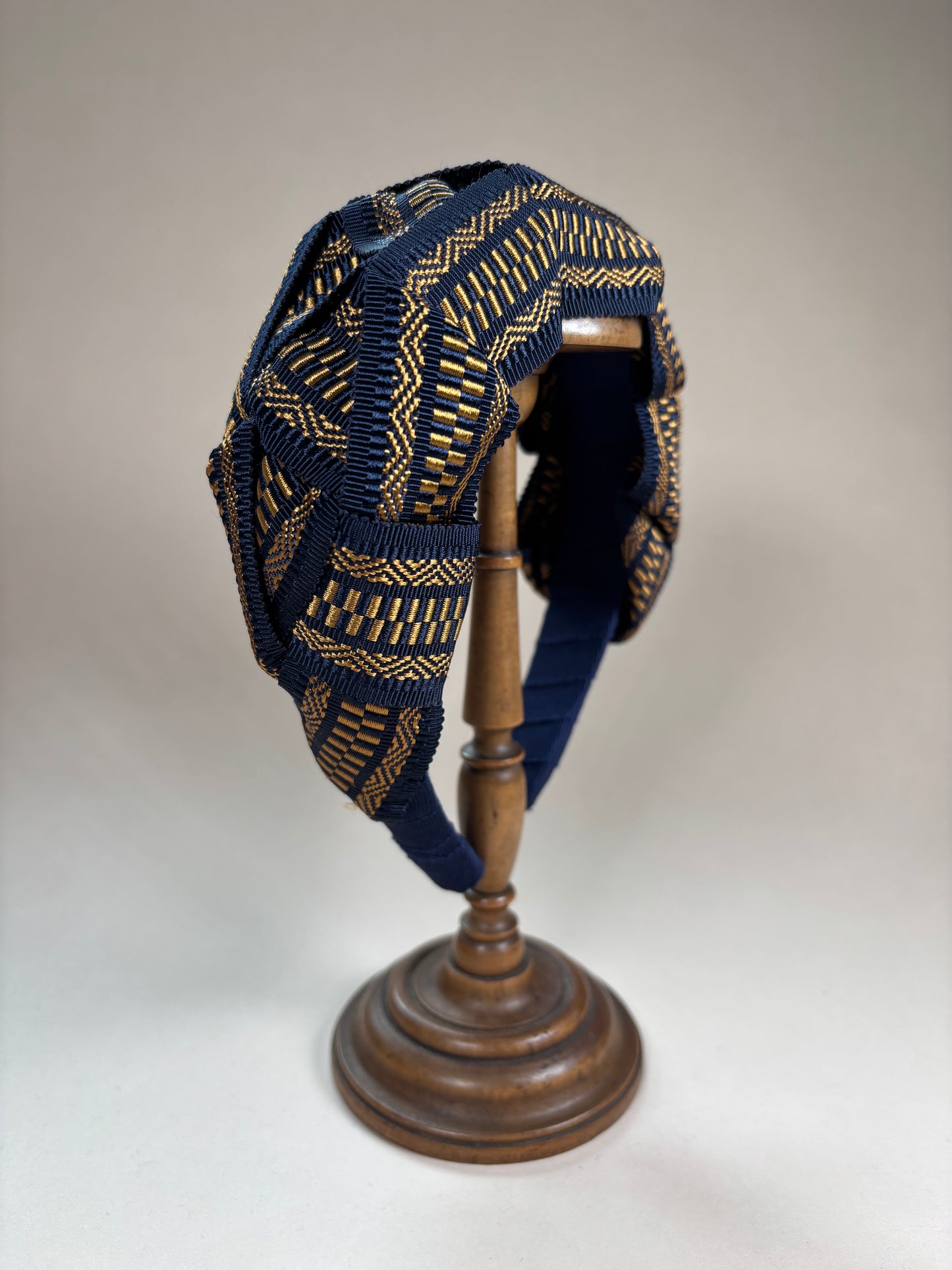 Mary in navy blue and gold