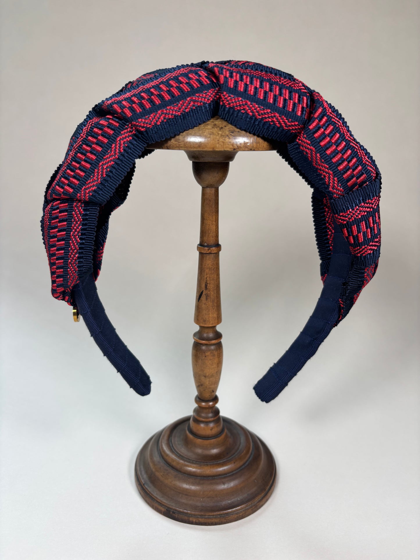 Mary in red and navy blue