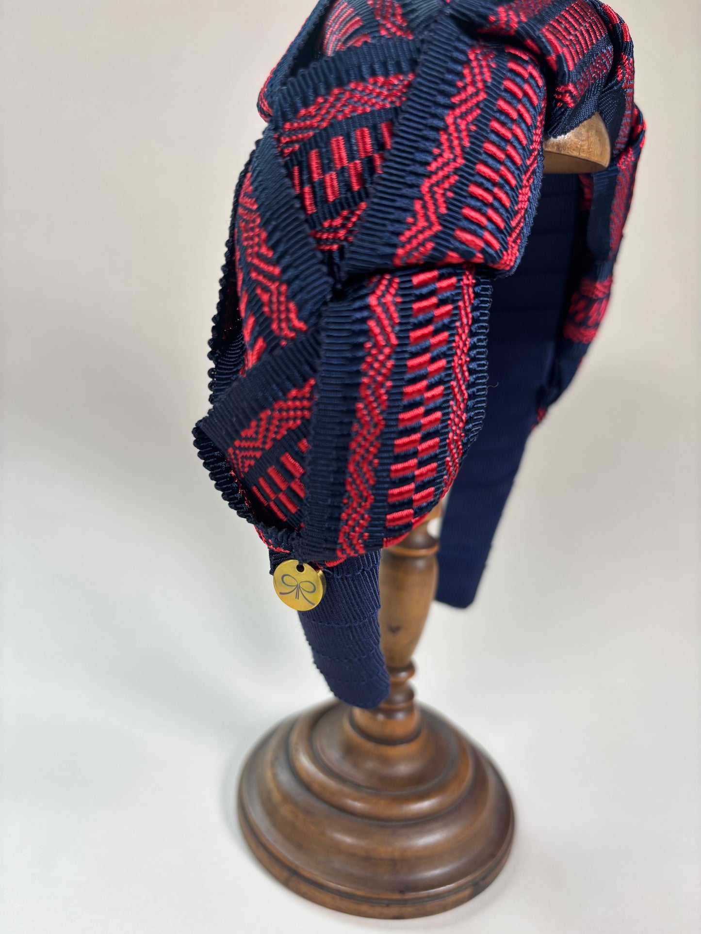 Mary in red and navy blue
