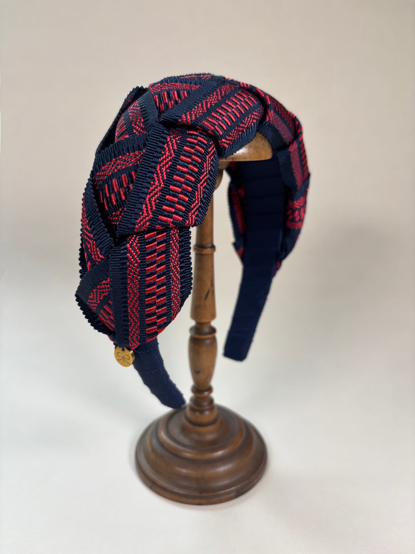 Mary in red and navy blue