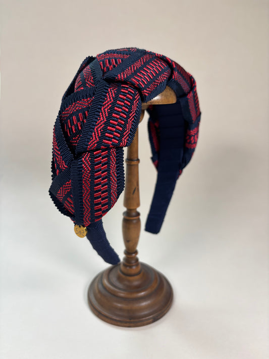 Mary in red and navy blue