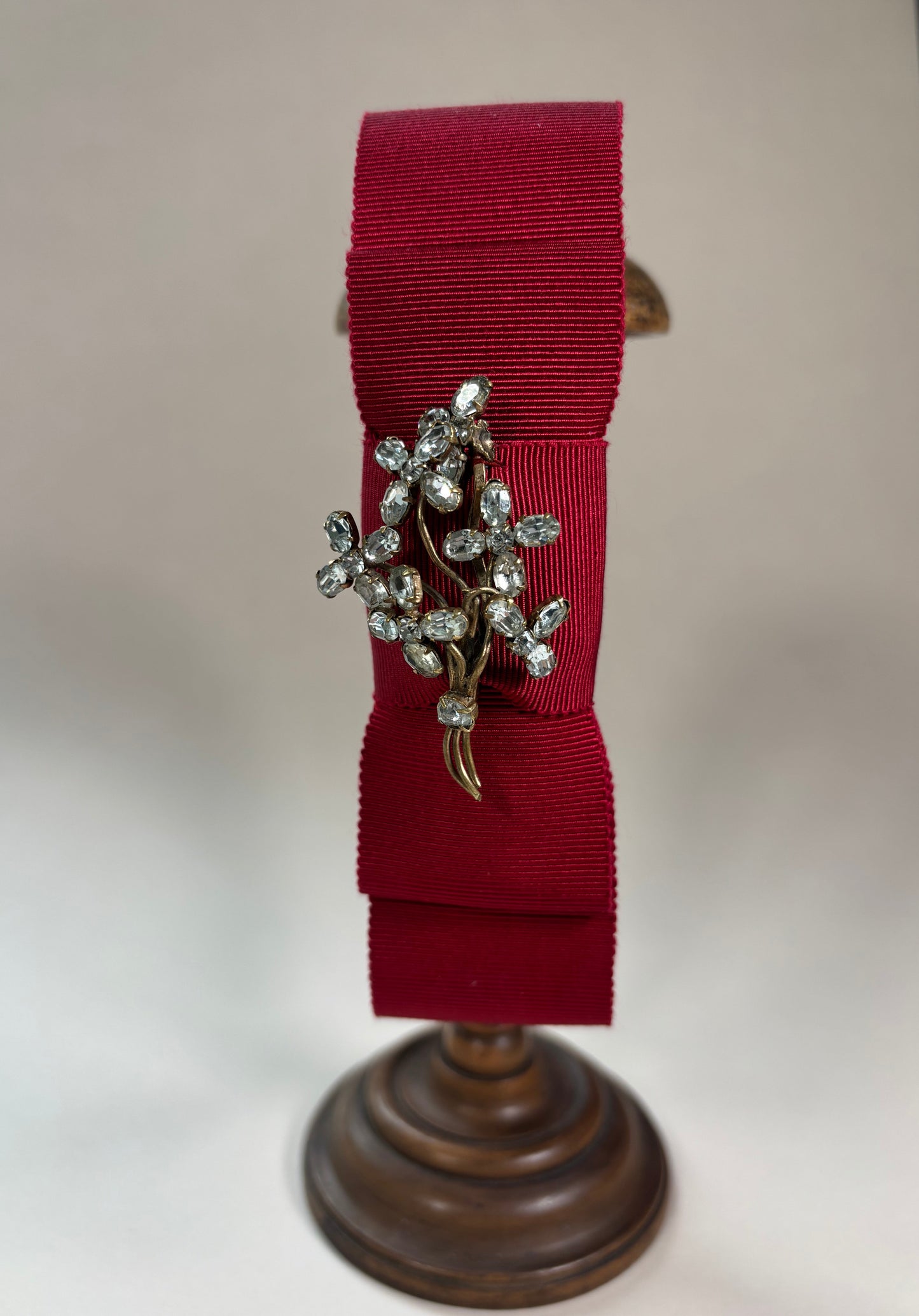 Red headband with a sparkling vintage flower