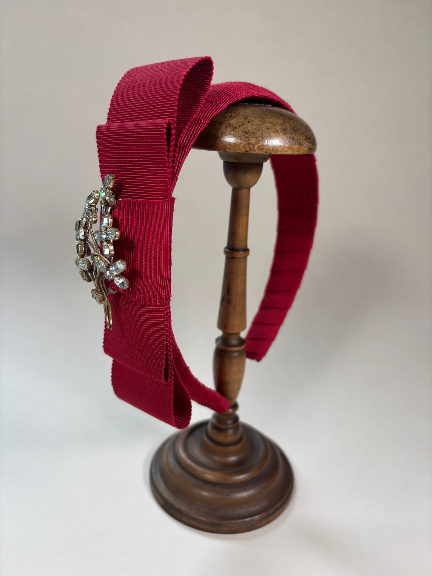 Red headband with a sparkling vintage flower