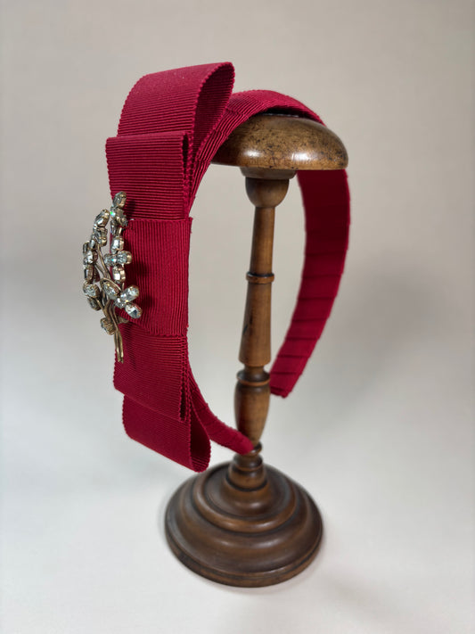 Red headband with a sparkling vintage flower