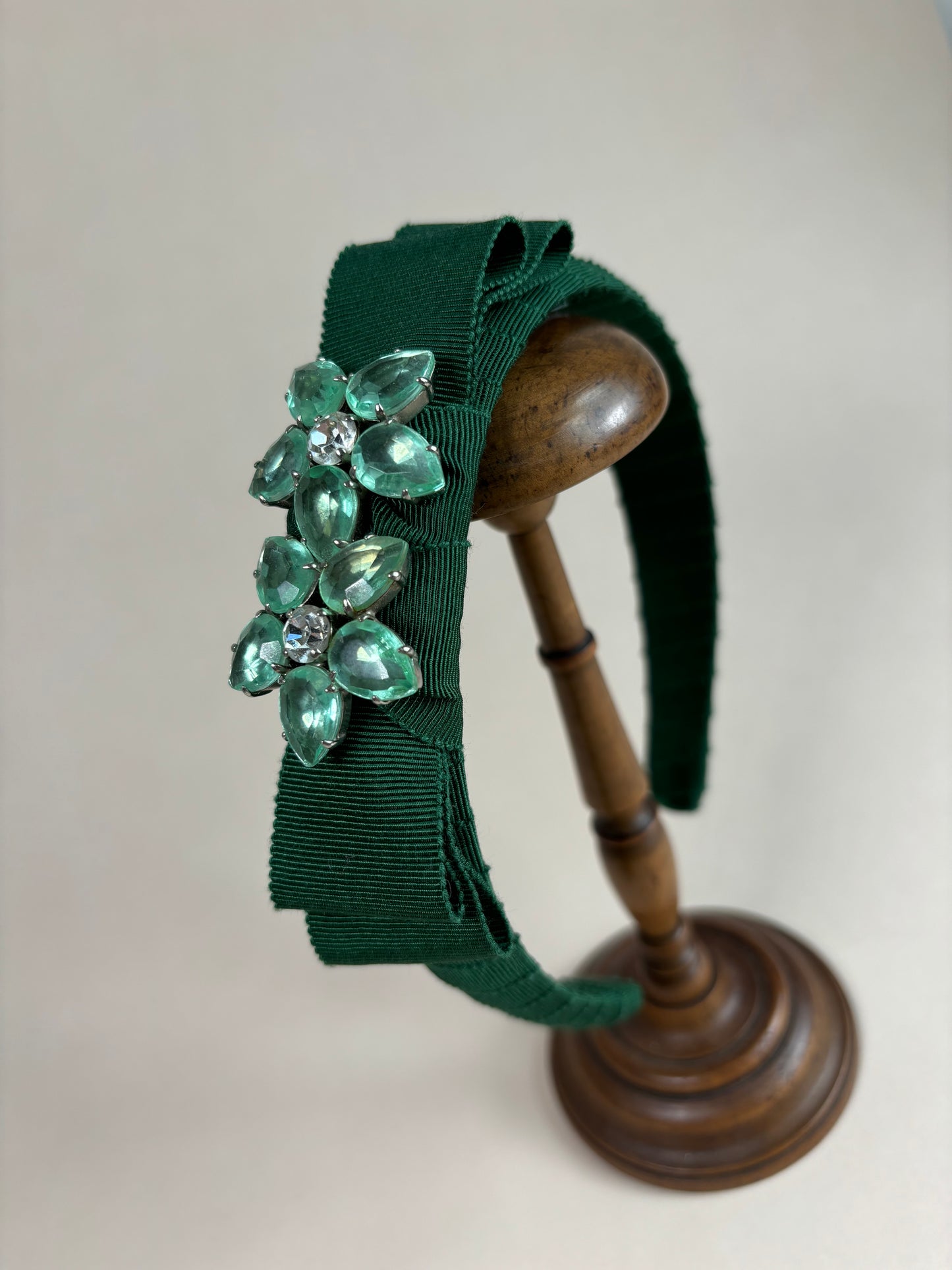 Statement piece in moss green with sparkling flower