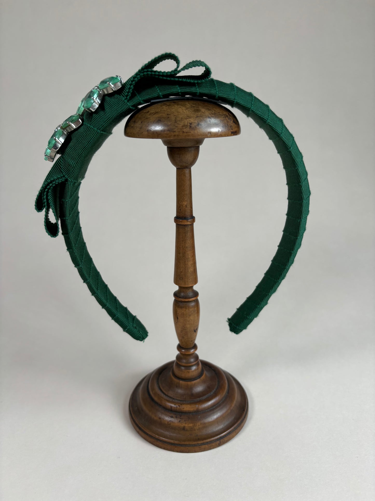 Statement piece in moss green with sparkling flower